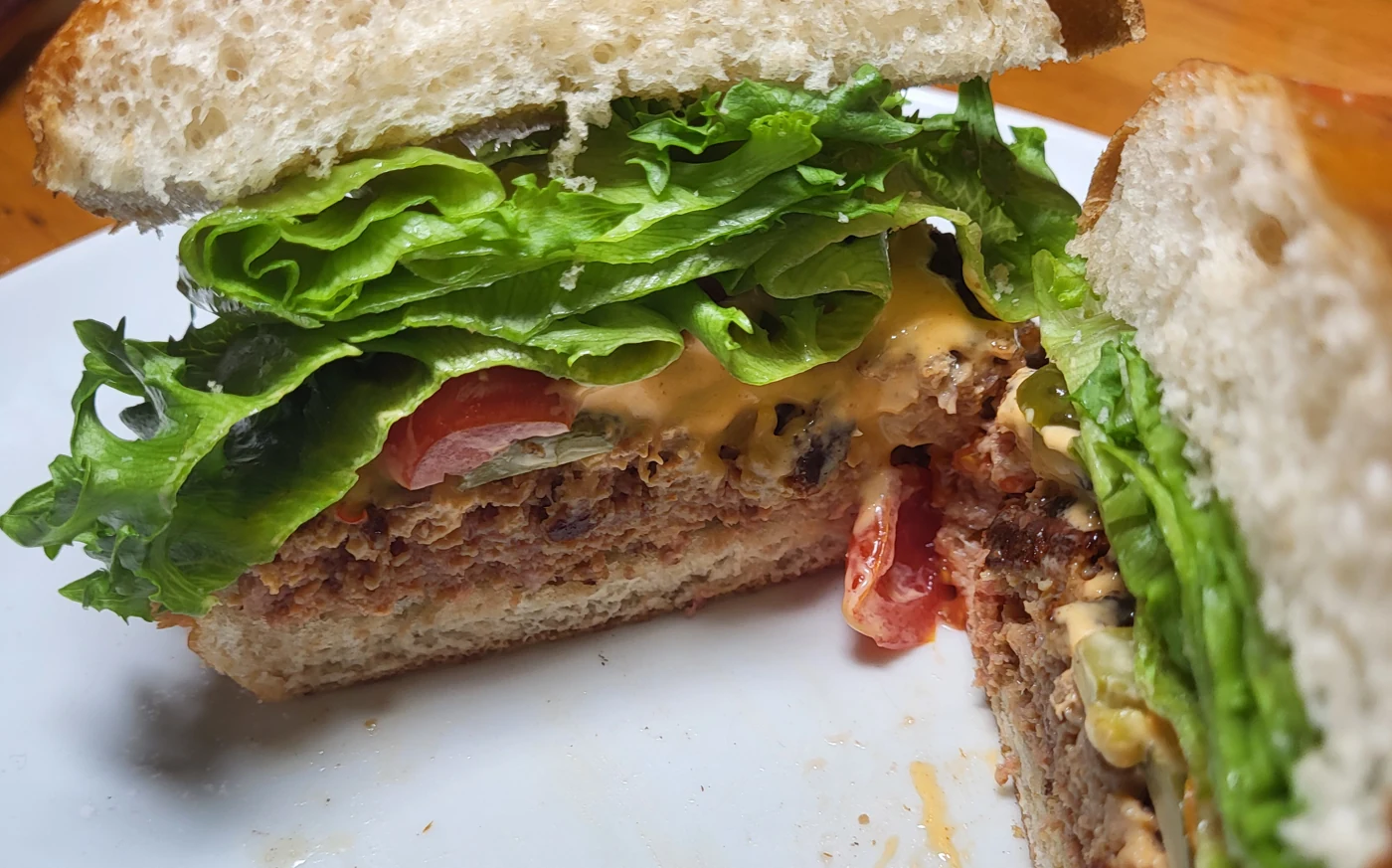 Cooked hybrid burger showing its internal texture
